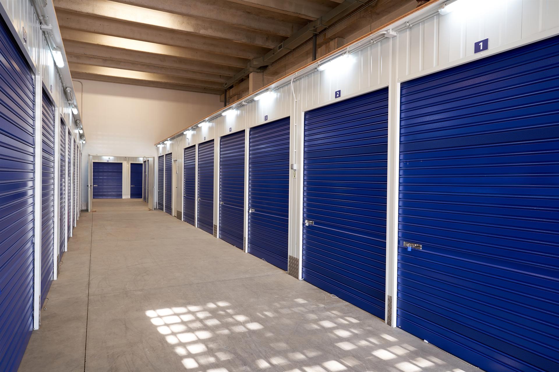 Long internal corridor of secure StorCo storage units